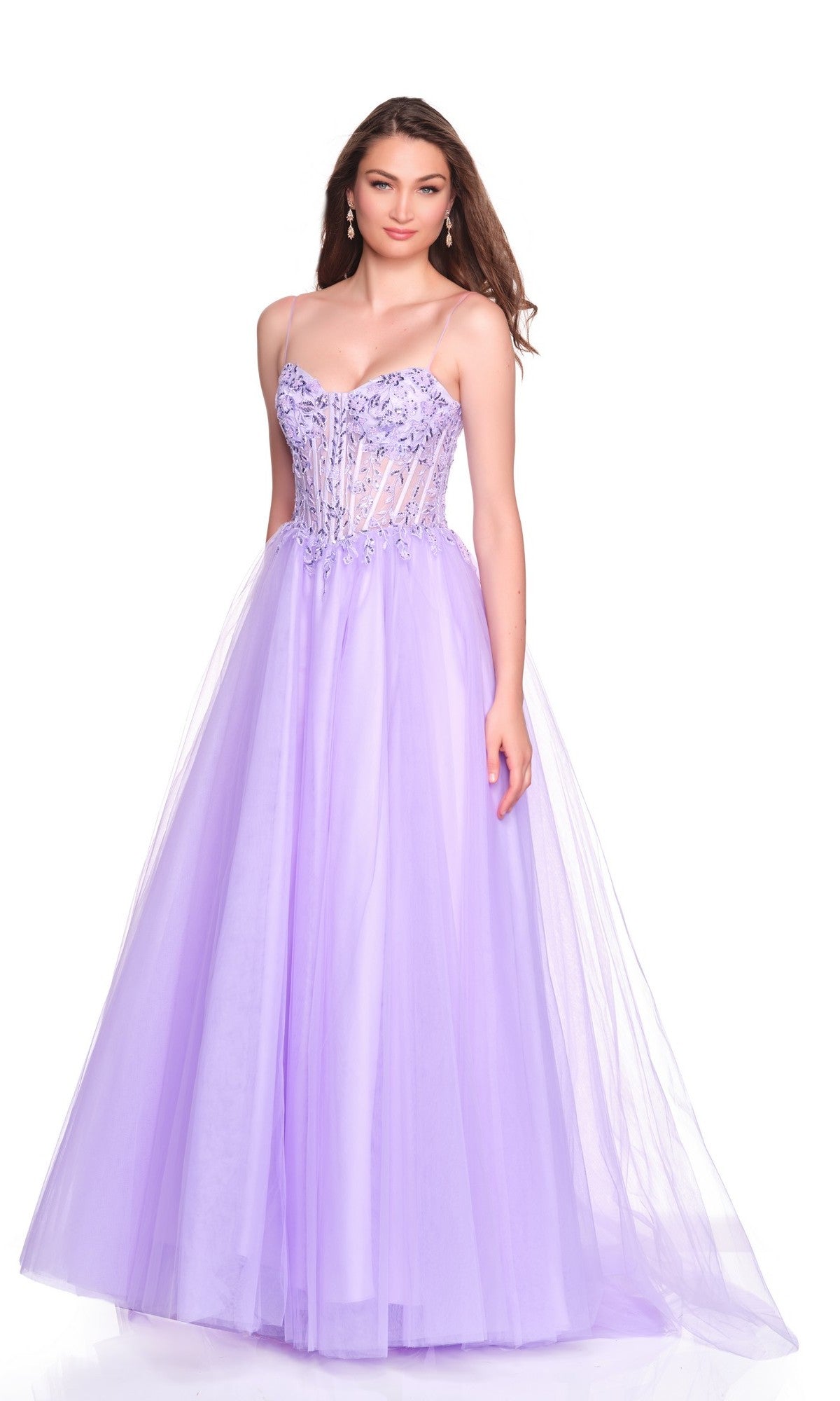 A woman wearing the Long Prom Dress: Dave and Johnny 12581, a lavender floor-length gown with a tulle A-line skirt and embellished thin-strap bodice, stands against a white background.